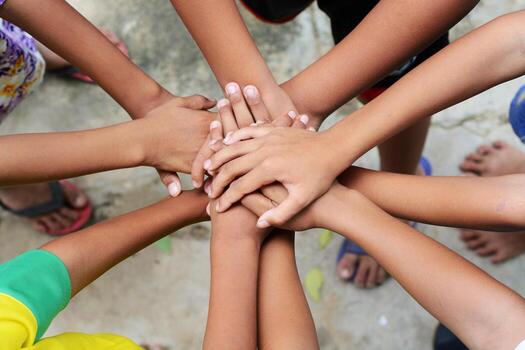 Hands joined together representing unity and cooperation